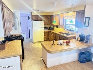 Nice 3 bedroom 2 bath home in desirable part of the community on Tucson Estates Golf Course in Arizona - for sale on GolfHomes.com, golf home, golf lot