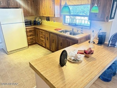 Nice 3 bedroom 2 bath home in desirable part of the community on Tucson Estates Golf Course in Arizona - for sale on GolfHomes.com, golf home, golf lot