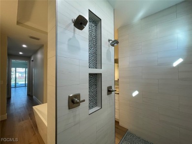 Stunning New Construction Pool Home in Southwest Cape Coral! 3 on Royal Tee Country Club in Florida - for sale on GolfHomes.com, golf home, golf lot