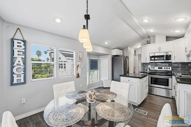 Beautifully updated and fully furnished park model with island on Long Island Golf Course in Texas - for sale on GolfHomes.com, golf home, golf lot