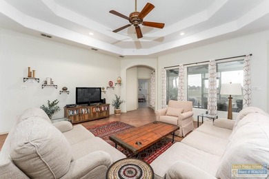 Effortless and elegant golf-course living in the SPI Golf on South Padre Island Golf Club in Texas - for sale on GolfHomes.com, golf home, golf lot