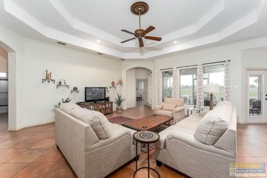 Effortless and elegant golf-course living in the SPI Golf on South Padre Island Golf Club in Texas - for sale on GolfHomes.com, golf home, golf lot