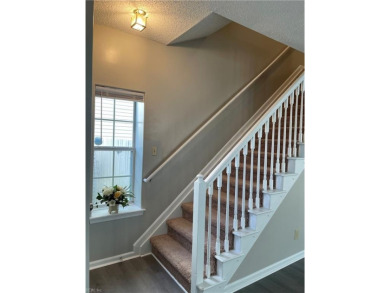 This welcoming 3-bedroom, 2.5-bathroom home is tucked away in on Kiln Creek Golf and Country Club in Virginia - for sale on GolfHomes.com, golf home, golf lot