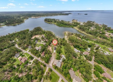 Experience unparalleled lakeside living at 147 Brushwood Ct on Rayburn Country Club in Texas - for sale on GolfHomes.com, golf home, golf lot