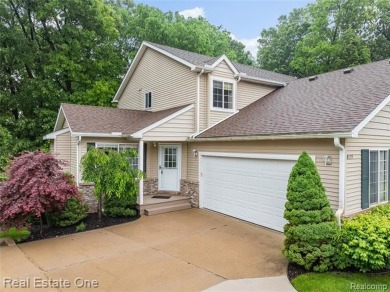 Move-in ready colonial tucked at the end of a peaceful on Whispering Pines Golf  in Michigan - for sale on GolfHomes.com, golf home, golf lot