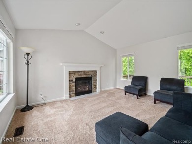 Move-in ready colonial tucked at the end of a peaceful on Whispering Pines Golf  in Michigan - for sale on GolfHomes.com, golf home, golf lot