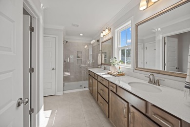 Set on a peaceful pond homesite in the Lochton subsection of on Cypress Point Par 3 in South Carolina - for sale on GolfHomes.com, golf home, golf lot