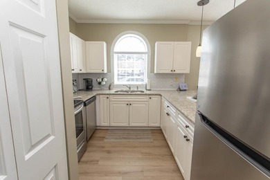 This rare ground floor, end unit has lots of natural light on  in South Carolina - for sale on GolfHomes.com, golf home, golf lot