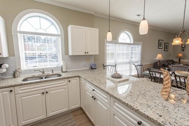 This rare ground floor, end unit has lots of natural light on  in South Carolina - for sale on GolfHomes.com, golf home, golf lot