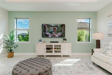 ZERO-CORNER SLIDERS - POND VIEW - 2.5-CAR GARAGE - TILE on Panther Run Golf Club in Florida - for sale on GolfHomes.com, golf home, golf lot