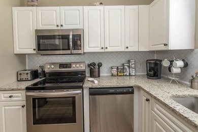 This rare ground floor, end unit has lots of natural light on  in South Carolina - for sale on GolfHomes.com, golf home, golf lot