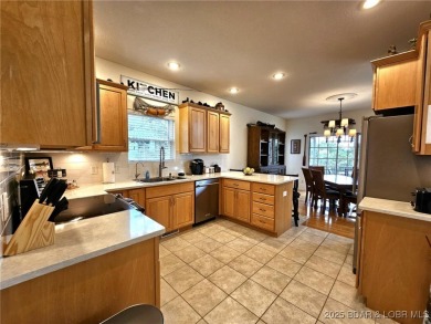 WELCOME TO SUNRISE RIDGE AT THE LAKE! Nestled in the well known on The Oaks Golf Course in Missouri - for sale on GolfHomes.com, golf home, golf lot
