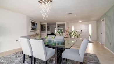 Finally, an updated POOL home in the NON-DEED RESTRICTED on Palm Aire Country Club of Sarasota in Florida - for sale on GolfHomes.com, golf home, golf lot