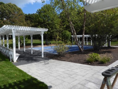 On The 6th Hole, this ''Vineyard'' end unit offers a lovely on The Golf Club At Southport in Massachusetts - for sale on GolfHomes.com, golf home, golf lot