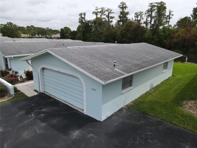 What a view! Come see this 1 bed, 1.5 bath home located on lake on Summertree Golf Course in Florida - for sale on GolfHomes.com, golf home, golf lot
