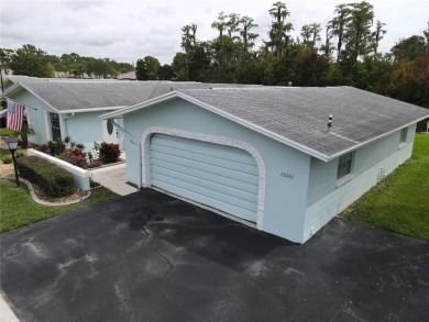 What a view! Come see this 1 bed, 1.5 bath home located on lake on Summertree Golf Course in Florida - for sale on GolfHomes.com, golf home, golf lot