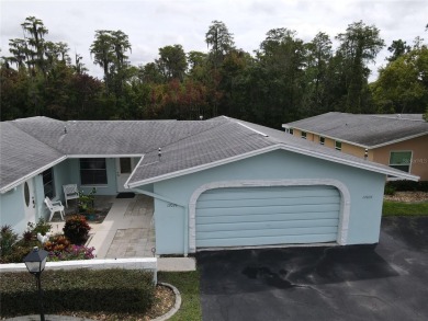 What a view! Come see this 1 bed, 1.5 bath home located on lake on Summertree Golf Course in Florida - for sale on GolfHomes.com, golf home, golf lot