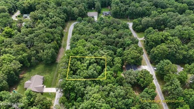 Settle into the serene side of Lake Tansi with this 0.26-acre on Lake Tansi Village Country Club in Tennessee - for sale on GolfHomes.com, golf home, golf lot