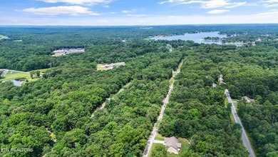 Settle into the serene side of Lake Tansi with this 0.26-acre on Lake Tansi Village Country Club in Tennessee - for sale on GolfHomes.com, golf home, golf lot