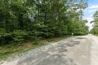 Settle into the serene side of Lake Tansi with this 0.26-acre on Lake Tansi Village Country Club in Tennessee - for sale on GolfHomes.com, golf home, golf lot