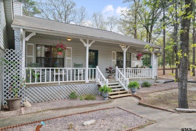 Beautifully maintained home in gated community. The cute covered on Holly Lake Ranch Golf Club in Texas - for sale on GolfHomes.com, golf home, golf lot