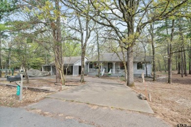 Beautifully maintained home in gated community. The cute covered on Holly Lake Ranch Golf Club in Texas - for sale on GolfHomes.com, golf home, golf lot