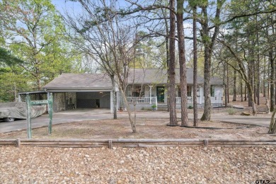 Beautifully maintained home in gated community. The cute covered on Holly Lake Ranch Golf Club in Texas - for sale on GolfHomes.com, golf home, golf lot