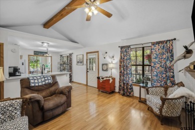 Beautifully maintained home in gated community. The cute covered on Holly Lake Ranch Golf Club in Texas - for sale on GolfHomes.com, golf home, golf lot