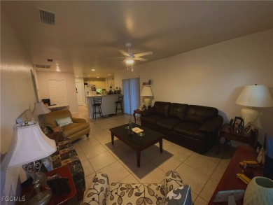 Charming Single-Family Home in Lehigh Acres - Spacious, Modern & on River Hall Country Club in Florida - for sale on GolfHomes.com, golf home, golf lot