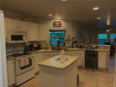 Charming Single-Family Home in Lehigh Acres - Spacious, Modern & on River Hall Country Club in Florida - for sale on GolfHomes.com, golf home, golf lot