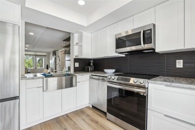 Welcome to your move-in-ready, FULLY FURNISHED dream home in a on Cove Cay Country Club in Florida - for sale on GolfHomes.com, golf home, golf lot