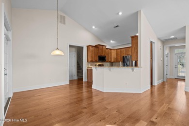 Welcome home to this beautiful 5-bedroom, 3-bath brick residence on Magnolia Greens Golf Plantation in North Carolina - for sale on GolfHomes.com, golf home, golf lot