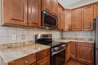 Welcome home to this beautiful 5-bedroom, 3-bath brick residence on Magnolia Greens Golf Plantation in North Carolina - for sale on GolfHomes.com, golf home, golf lot