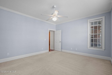 Welcome home to this beautiful 5-bedroom, 3-bath brick residence on Magnolia Greens Golf Plantation in North Carolina - for sale on GolfHomes.com, golf home, golf lot