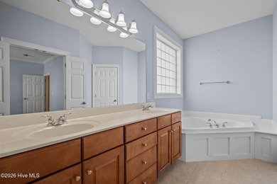 Welcome home to this beautiful 5-bedroom, 3-bath brick residence on Magnolia Greens Golf Plantation in North Carolina - for sale on GolfHomes.com, golf home, golf lot