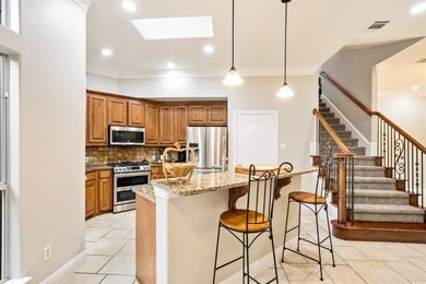 This 3-bedroom, 2.5-bath home offers a functional two-story on The Golf Club at Resort Eagle Mountain Lake in Texas - for sale on GolfHomes.com, golf home, golf lot