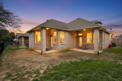 This 3-bedroom, 2.5-bath home offers a functional two-story on The Golf Club at Resort Eagle Mountain Lake in Texas - for sale on GolfHomes.com, golf home, golf lot