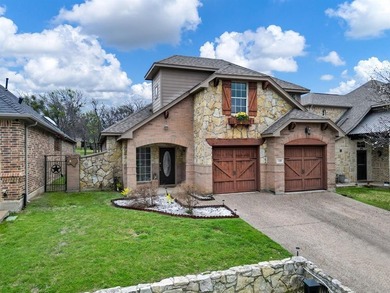 This 3-bedroom, 2.5-bath home offers a functional two-story on The Golf Club at Resort Eagle Mountain Lake in Texas - for sale on GolfHomes.com, golf home, golf lot