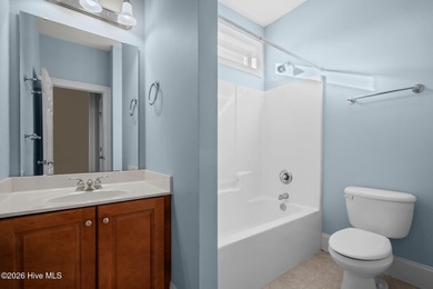 Welcome home to this beautiful 5-bedroom, 3-bath brick residence on Magnolia Greens Golf Plantation in North Carolina - for sale on GolfHomes.com, golf home, golf lot