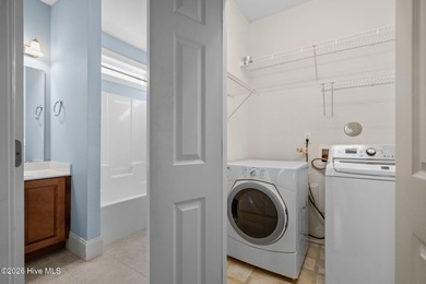 Welcome home to this beautiful 5-bedroom, 3-bath brick residence on Magnolia Greens Golf Plantation in North Carolina - for sale on GolfHomes.com, golf home, golf lot