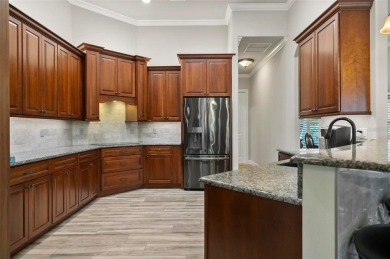 Tucked away on a private cul-de-sac in Grand Haven, this custom on Grand Haven Golf Club in Florida - for sale on GolfHomes.com, golf home, golf lot