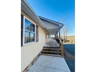 Spacious 4-bedroom, 3 full-bath home located on the 8th hole of on Skyland Lakes Golf Course in Virginia - for sale on GolfHomes.com, golf home, golf lot