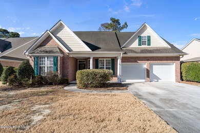 Welcome home to this beautiful 5-bedroom, 3-bath brick residence on Magnolia Greens Golf Plantation in North Carolina - for sale on GolfHomes.com, golf home, golf lot