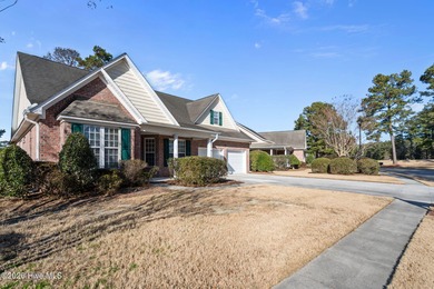 Welcome home to this beautiful 5-bedroom, 3-bath brick residence on Magnolia Greens Golf Plantation in North Carolina - for sale on GolfHomes.com, golf home, golf lot