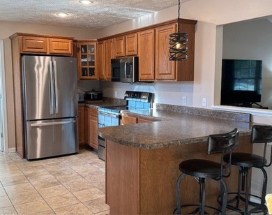 Spacious 4-bedroom, 3 full-bath home located on the 8th hole of on Skyland Lakes Golf Course in Virginia - for sale on GolfHomes.com, golf home, golf lot