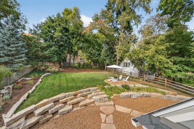 Full of character and charm, this beautiful Dutch Colonial sits on Nakoma Golf Club in Wisconsin - for sale on GolfHomes.com, golf home, golf lot
