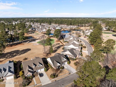 Welcome home to this beautiful 5-bedroom, 3-bath brick residence on Magnolia Greens Golf Plantation in North Carolina - for sale on GolfHomes.com, golf home, golf lot
