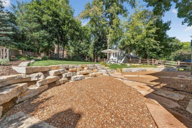 Full of character and charm, this beautiful Dutch Colonial sits on Nakoma Golf Club in Wisconsin - for sale on GolfHomes.com, golf home, golf lot
