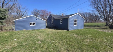 Investor special directly across from Ingersoll Golf Course! on Ingersoll Golf Course and Learning Links in Illinois - for sale on GolfHomes.com, golf home, golf lot
