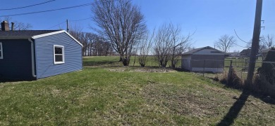 Investor special directly across from Ingersoll Golf Course! on Ingersoll Golf Course and Learning Links in Illinois - for sale on GolfHomes.com, golf home, golf lot